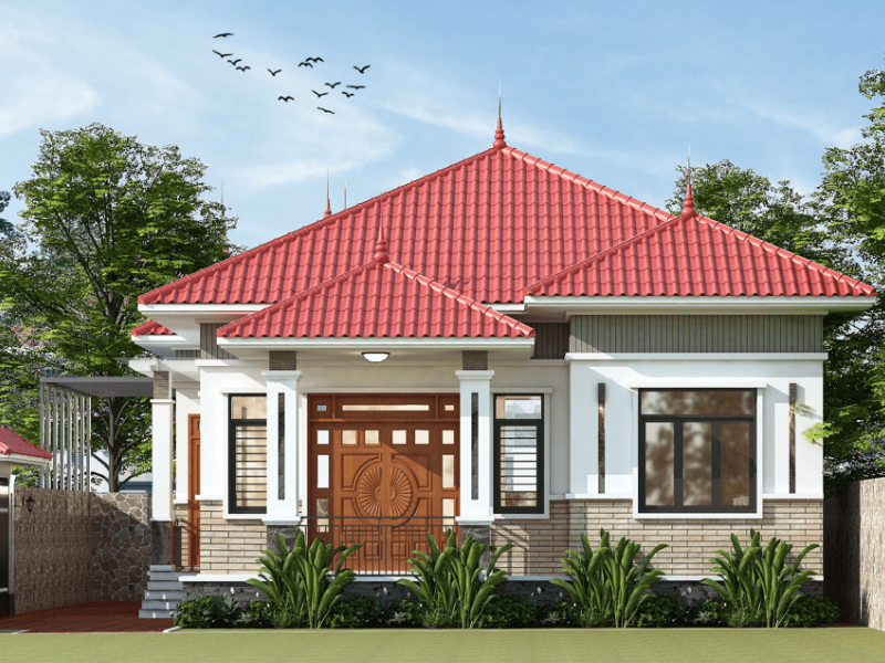 Mẫu nhà mái ngói kiểu biệt thự nổi bật trên nền tường sơn trắng tạo nên điểm nhấn rực rỡ, gần gũi và ấm áp