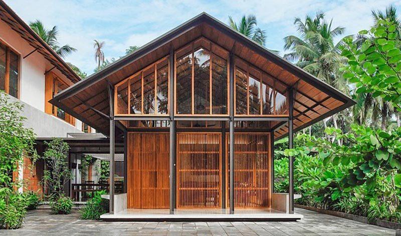 Mẫu nhà cấp 4 gác lửng bằng gỗ đẹp với nhiều cửa sổ thoáng đãng, đầy tính thẩm mỹ